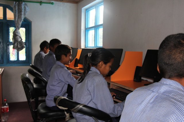 Students checking the computers